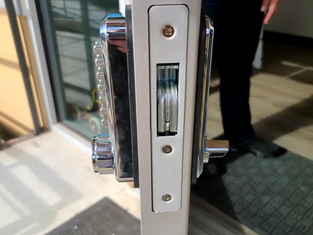 Storefront glass door with a commercial mortise lock
