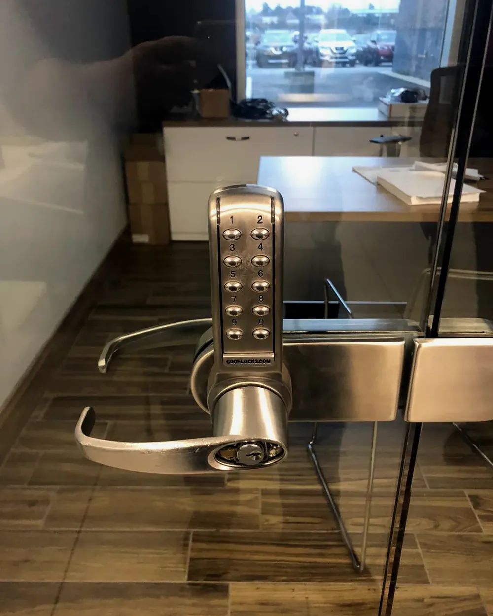 Keypad lock on a glass storefront door