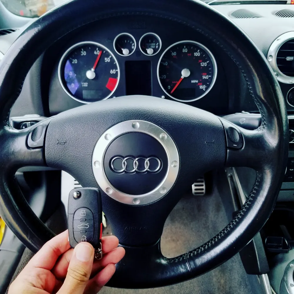 New Audi flip key at the steering wheel of an Audi TT