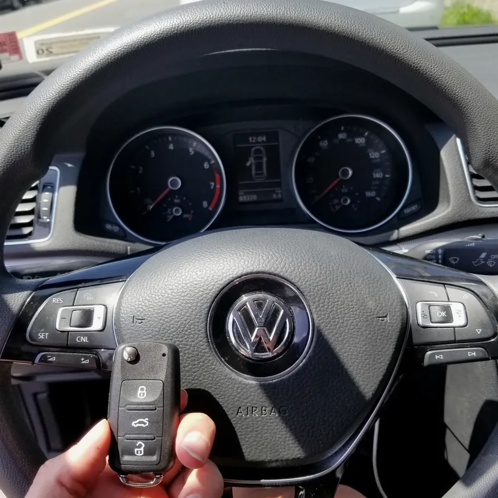 New Volkswagen flip key at the steering wheel