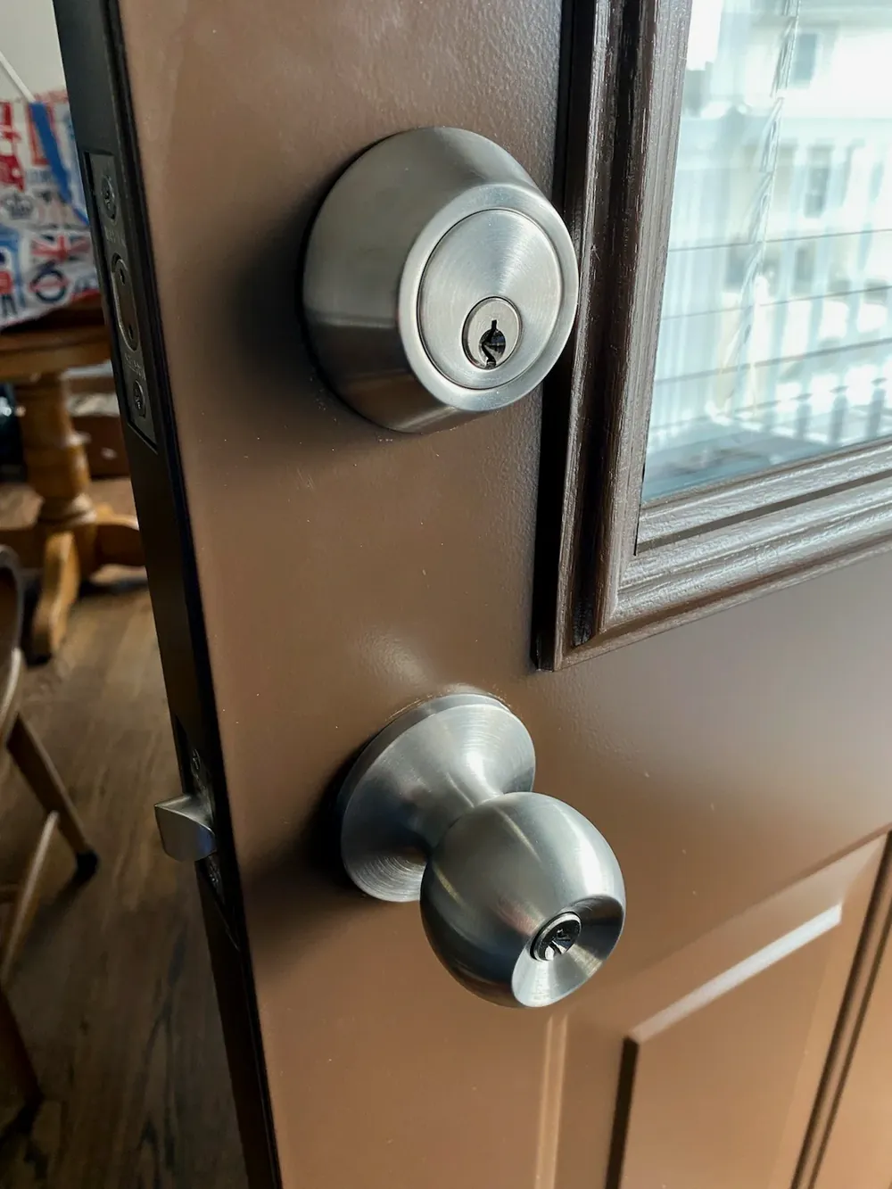 Deadbolt above a knob lock on a side door