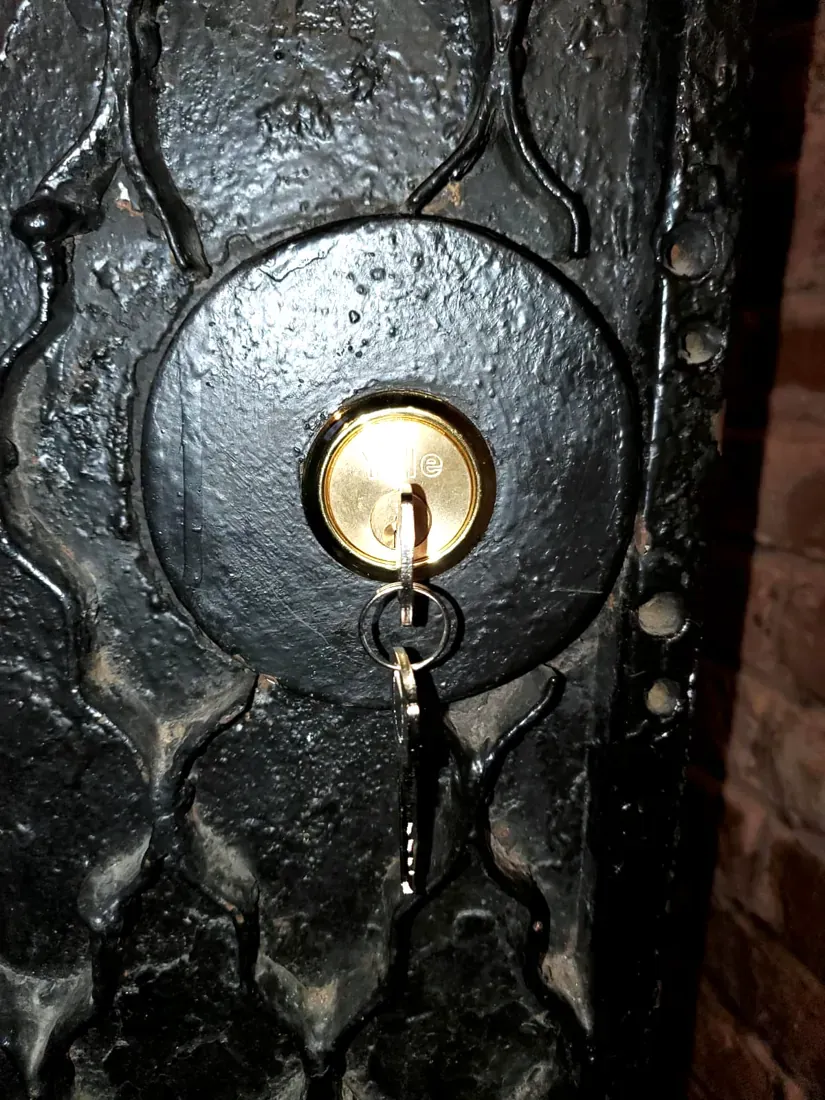 Deadbolt on an ornate front door