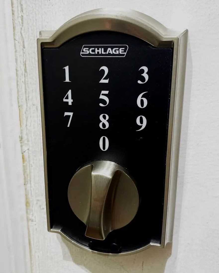 Schlage touchscreen smart deadbolt installed on a front door